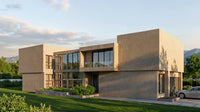Modern house with concrete exterior and glass windows, surrounded by greenery and mountains.