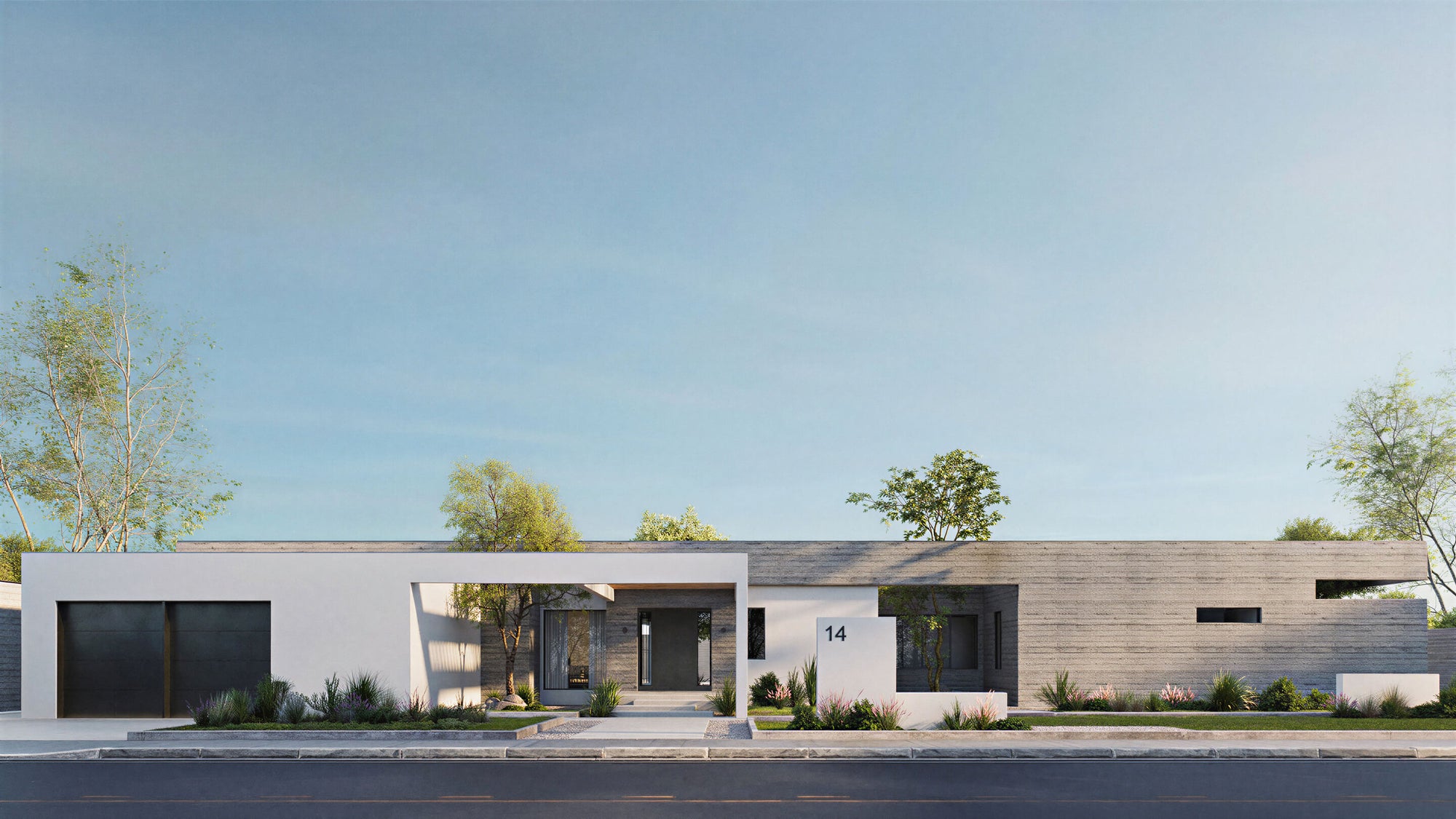 Modern house with a flat roof and minimalistic design against a clear blue sky.