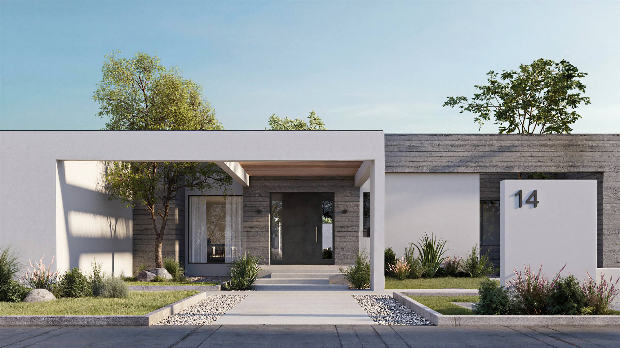 Modern house exterior with a driveway and trees