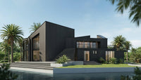 Modern black house with palm trees and a clear blue sky
