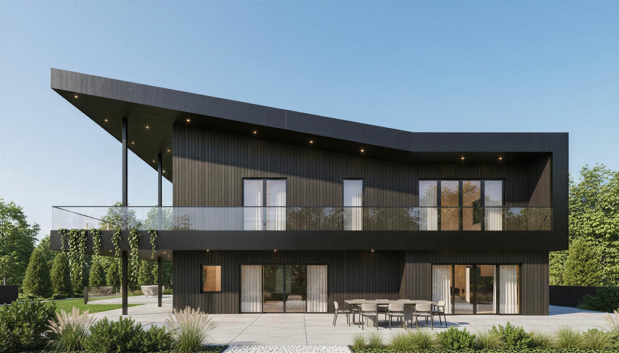Modern black house with glass windows and a clear blue sky