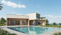 Modern house with a pool and ocean view under a clear blue sky.