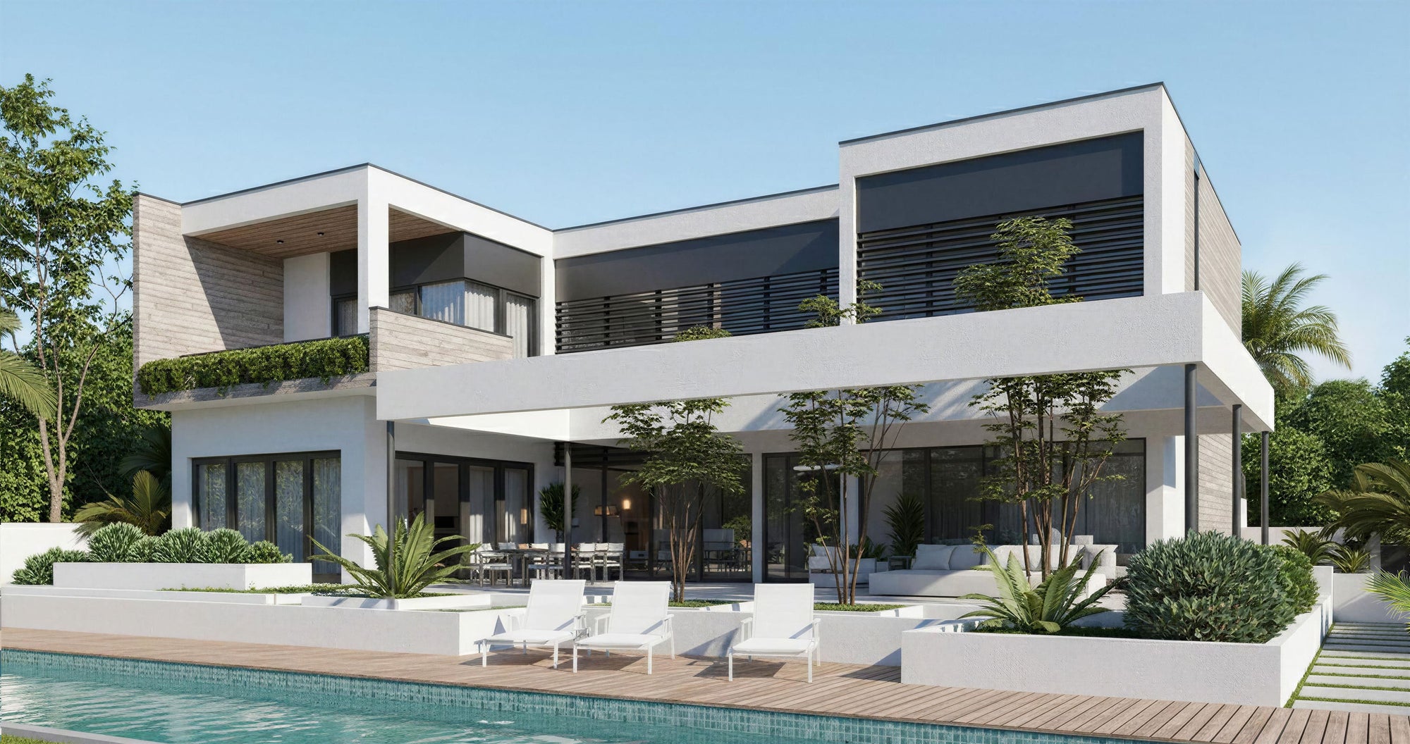 Modern house with a pool and outdoor furniture on a clear day