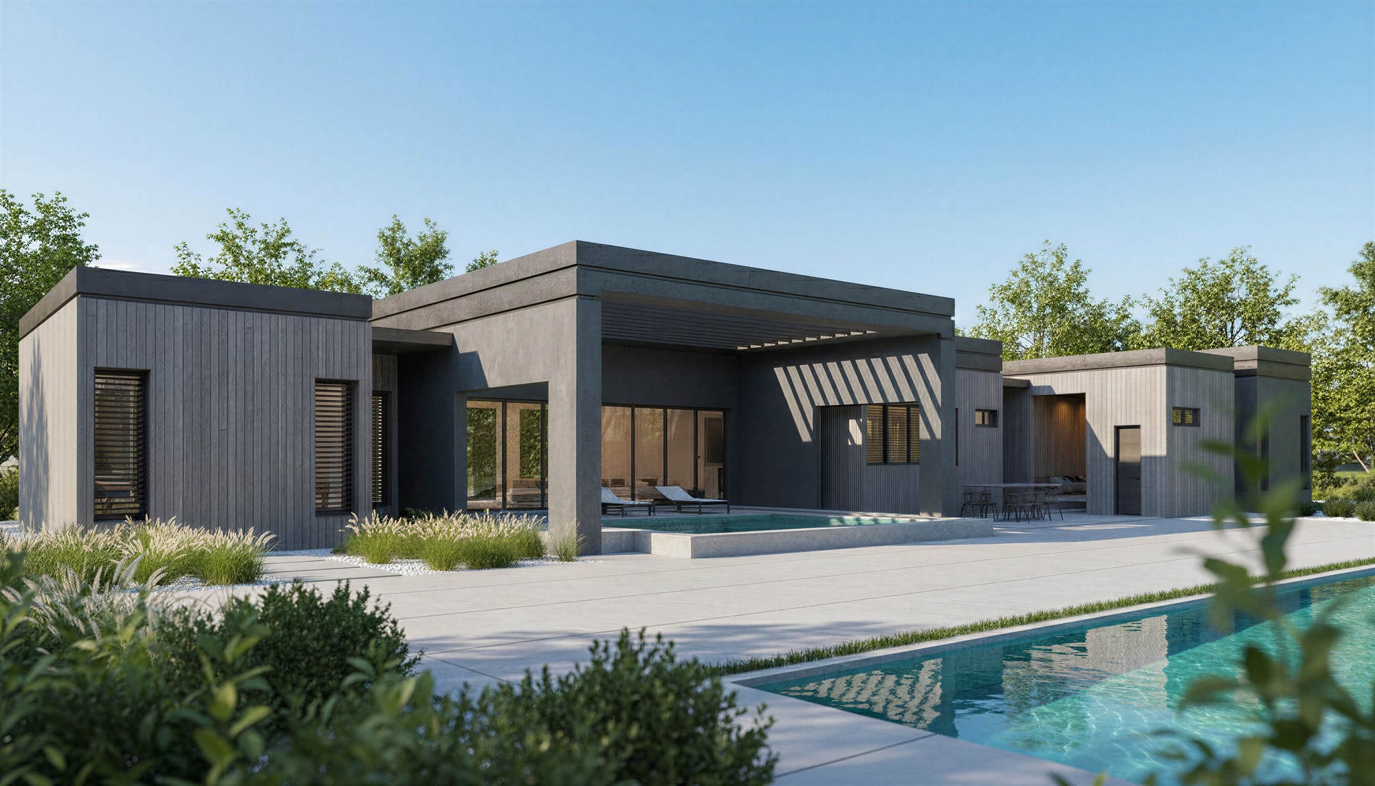 Modern house with a pool and garden under a clear blue sky