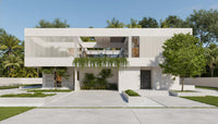 Modern white house with greenery in a suburban setting
