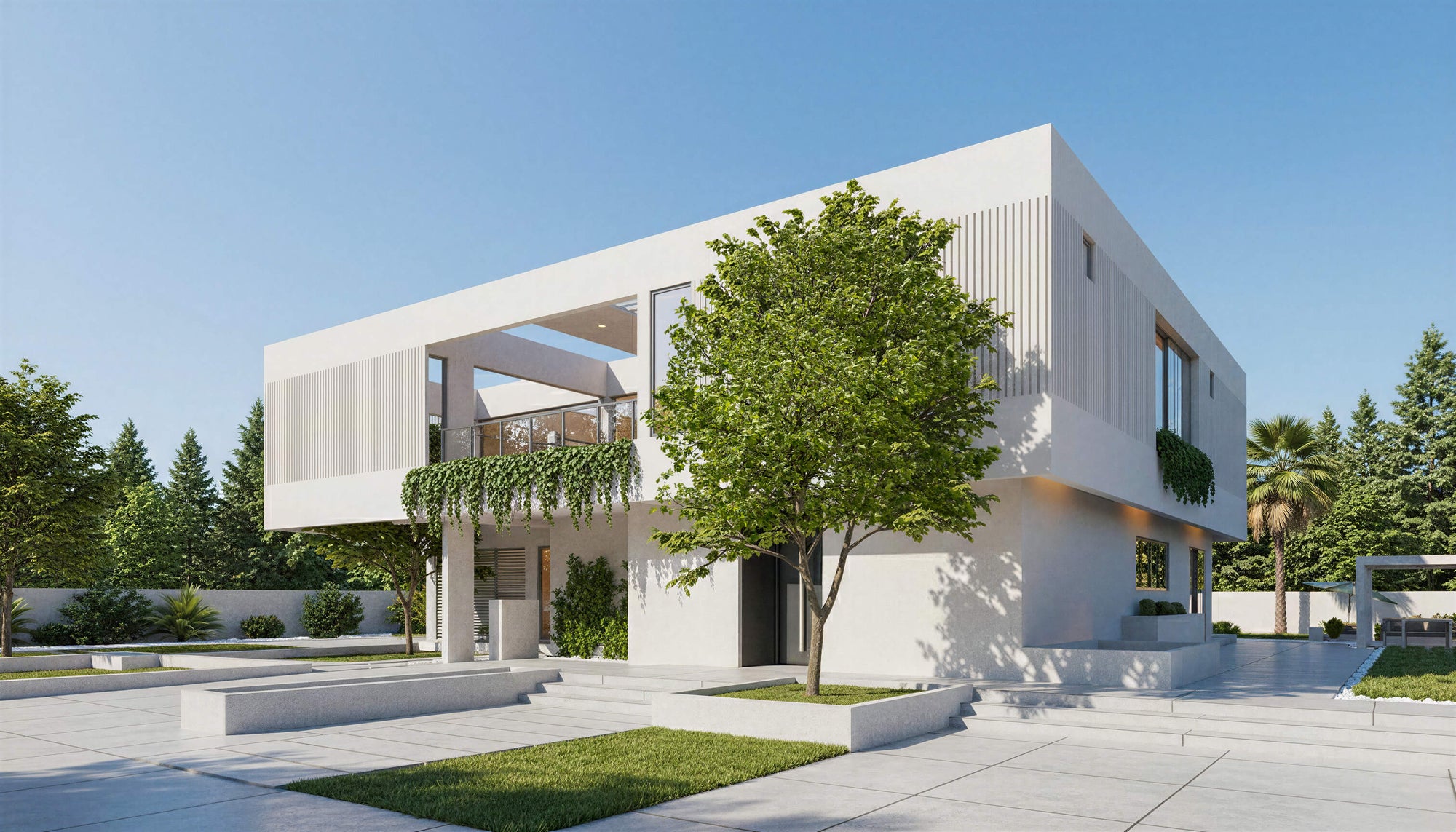 Modern white house with greenery on a clear day