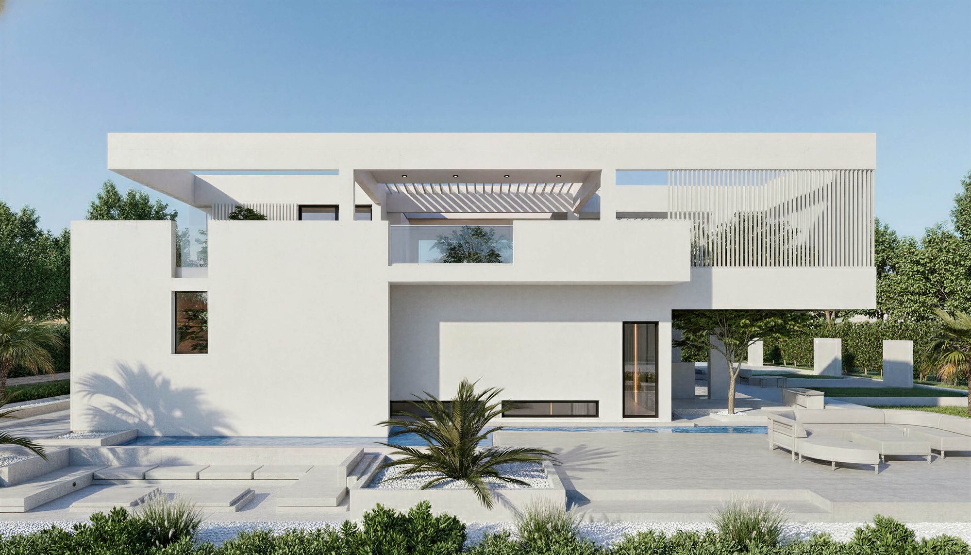 Modern white house with a pool and outdoor furniture on a clear day