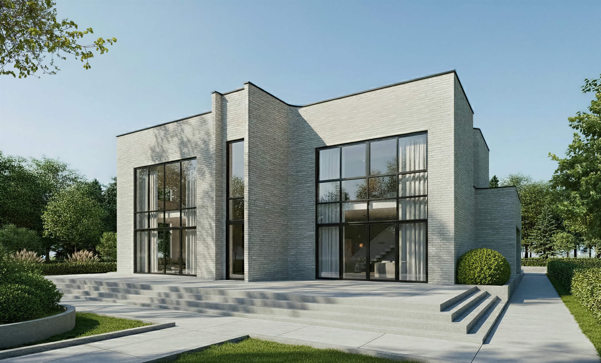 Modern house with large windows and a clear blue sky